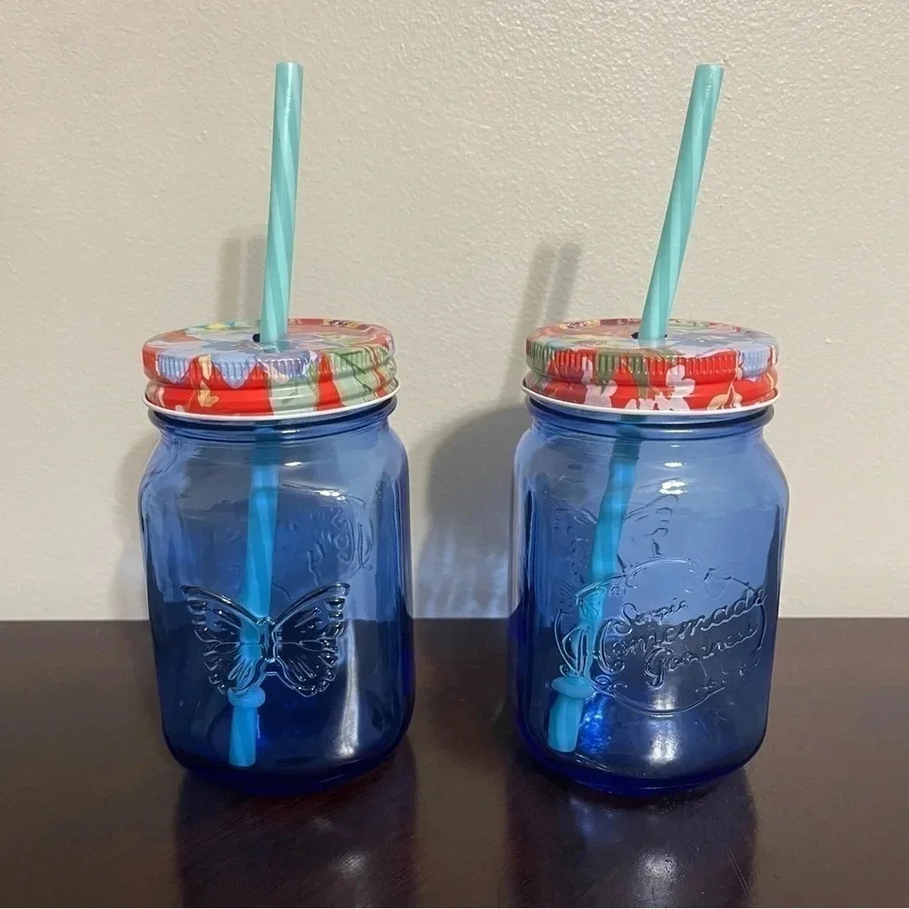 Pioneer Woman Blue Glass Drinking cups with lids and straws set of 2